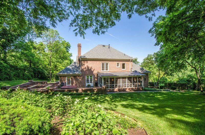 A large, lush back yard provides plenty of privacy and ample room to play.