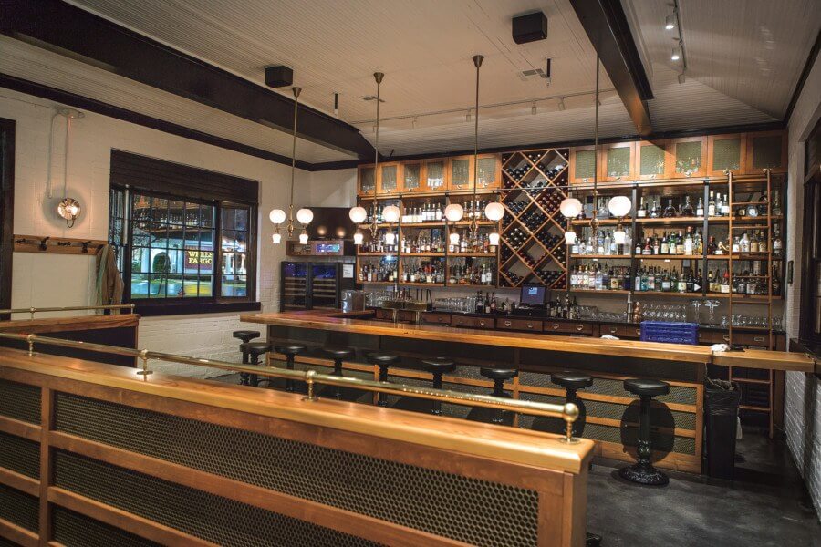 The bar at The Depot is sleek, yet inviting. Image: Tristan Cairns Photography The bar at The Depot is sleek, yet inviting. Image: Tristan Cairns Photography