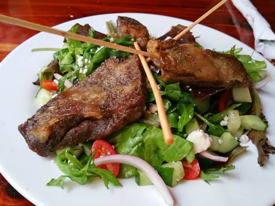 The lamb skewers on baby green salad are delish! The lamb skewers on baby green salad are delish!