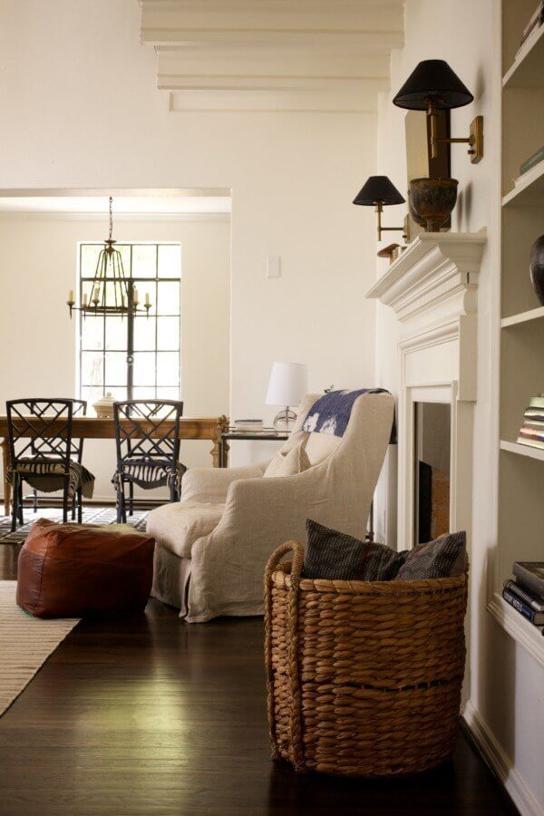 The beautiful dark wood floors catch the light in a soft, romantic way.