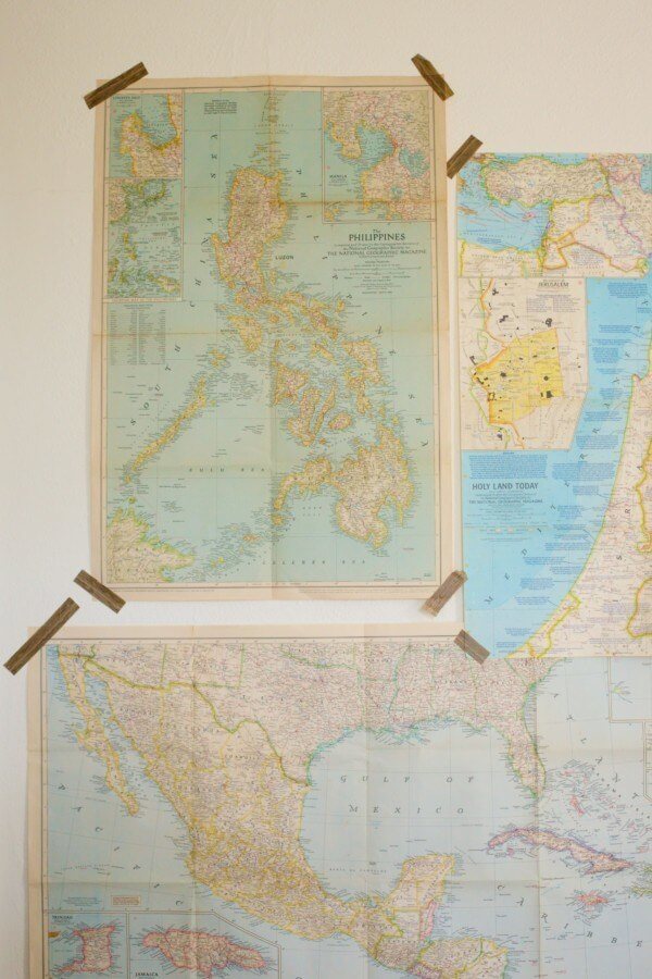 Caroline decorates the walls of Jack Bailey's room with a mix of vintage maps, simply taped to the walls for a laid-back, throwback look.