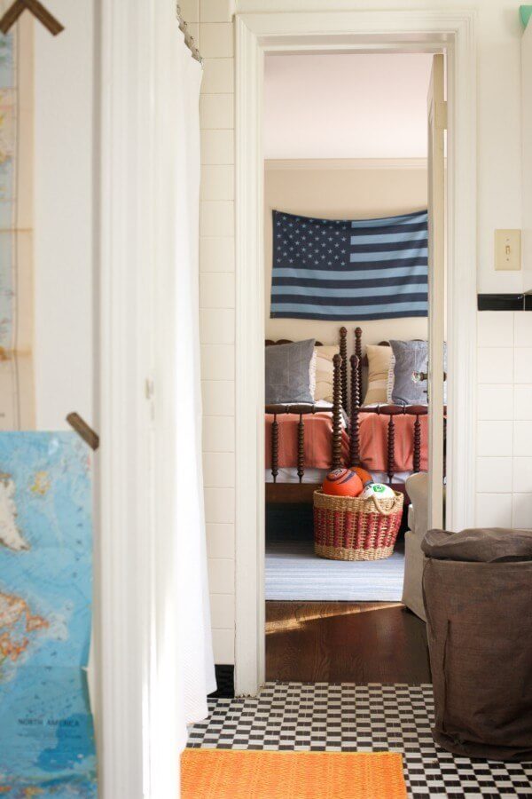 The boys' rooms are connected by a shared bathroom that features original black-and-white tile.