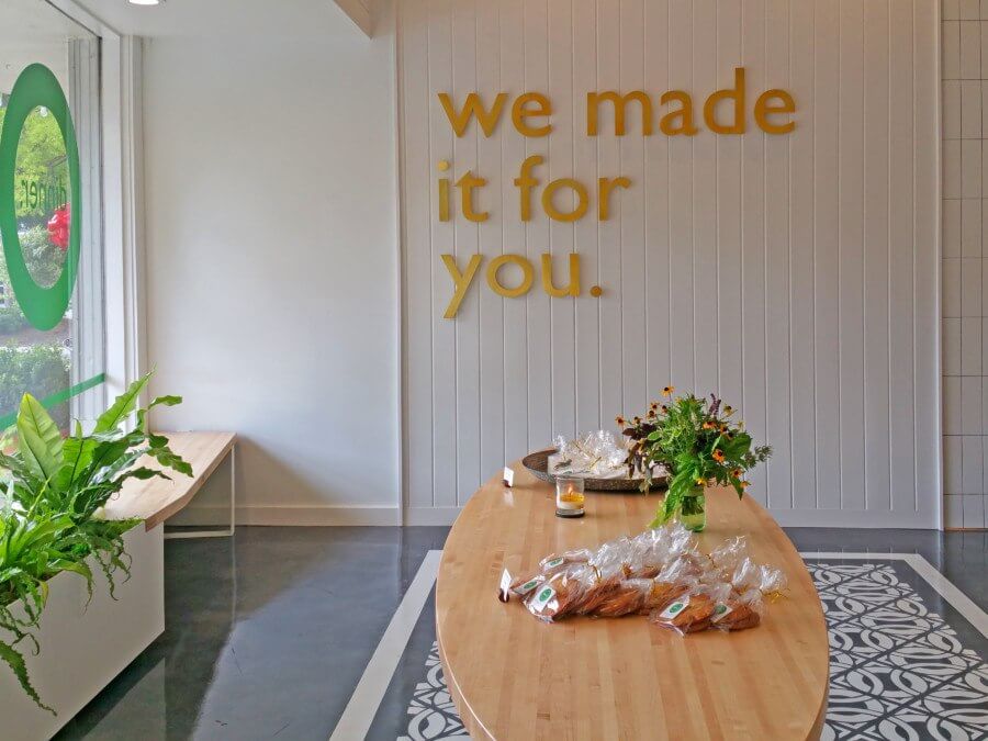 Candles, greenery and flowers adorn the calm, refreshing space. 