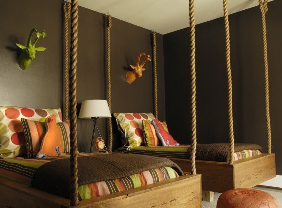 Rich brown is offset by vibrant orange, bold red and lime green for a look that is made even more striking by the fabulous hanging beds. Image: Howard Lee Puckett Photography