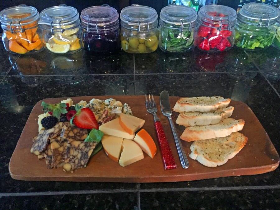 Pair your cocktail with this tempting charcuterie plate. 