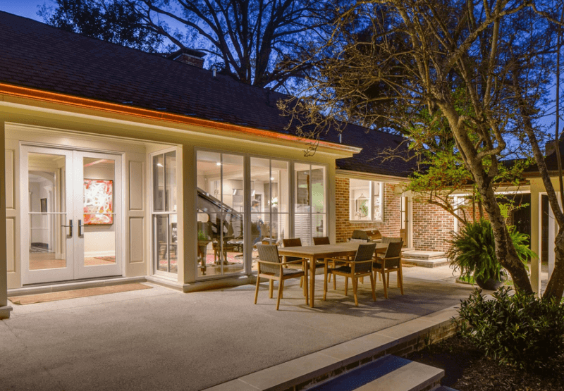 Large bay box windows were a focal point of the renovation, which included a large patio for al fresco entertaining. |Image: Chad Mellon https://www.chadmellon.com 