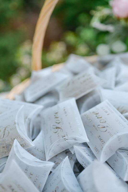 Packets of wildflower seeds personalized with Sarah and John’s names and the wedding date were sent home with guests.