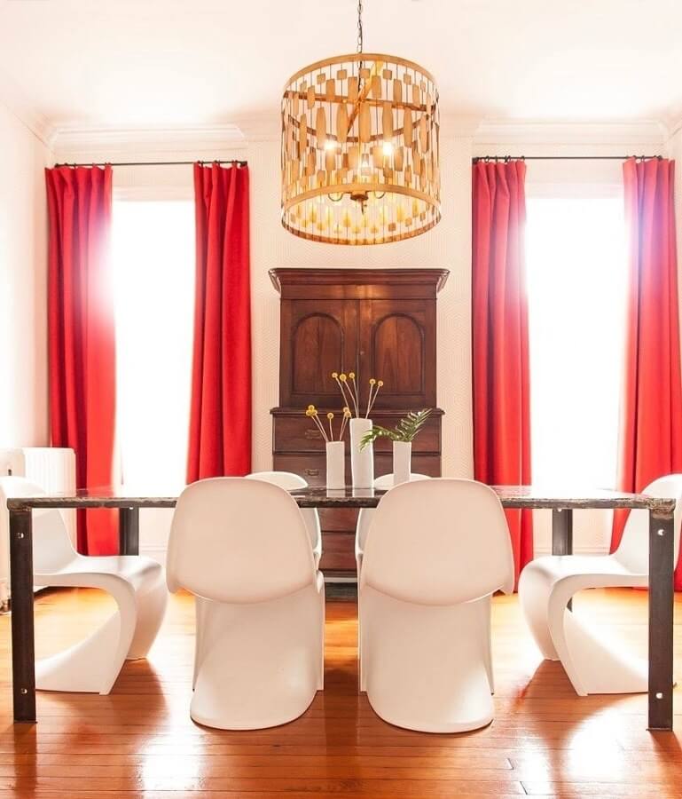 The 10 foot ceilings in this 1900’s home enabled Lesley to make bold statements with the sleek dining room chairs, big furniture, and standout floor-length drapes. The combination certainly makes any visitor’s jaw drop when they enter the room. The 10 foot ceilings in this 1900’s home enabled Lesley to make bold statements with the sleek dining room chairs, big furniture, and standout floor-length drapes. The combination certainly makes any visitor’s jaw drop when they enter the room.