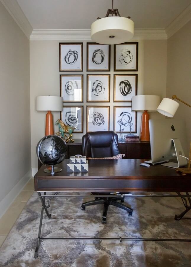 A set of nine abstract prints from Soicher-Marin (soicher-marin.com) energizes the home office. Desk is by Bernhardt (bernhardt.com). A set of nine abstract prints from Soicher-Marin (soicher-marin.com) energizes the home office. Desk is by Bernhardt (bernhardt.com).