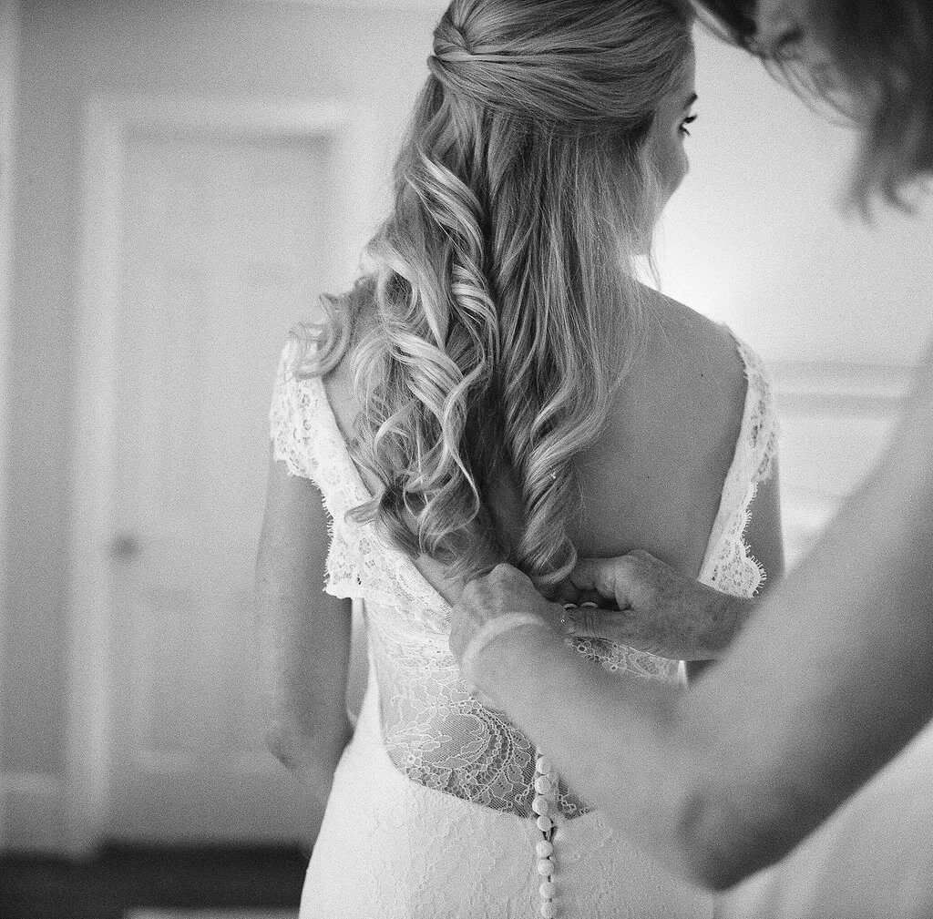 Joslyn found her beautiful wedding gown at Carriage House in Homewood. Her bridal consultant, Paige Drew, helped lead Joslyn to the mermaid-style gown with delicate lace overlay and helped design it as well.
