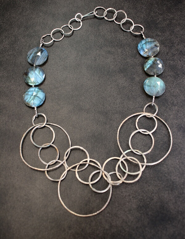 "Original art comes in all shapes, sizes and budgets," says Pat Brown of T. Clifton Art Gallery. And art is functional, too, like this hand tooled fine silver necklace that features uniquely cut labradorite by Memphis artist Dorothy Northern, $345 at T. Clifton Gallery. "Original art comes in all shapes, sizes and budgets," says Pat Brown of T. Clifton Art Gallery. And art is functional, too, like this hand tooled fine silver necklace that features uniquely cut labradorite by Memphis artist Dorothy Northern, $345 at T. Clifton Gallery.