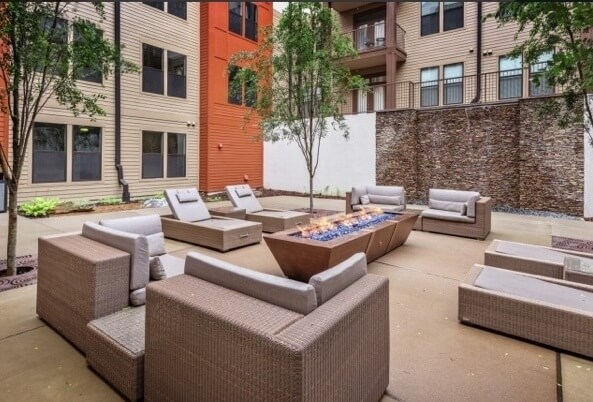 Urban living takes on a comfortable vibe with fantastic amenities like this outdoor common area, complete with fire pit. Image: 23Hundred at Berry Hill