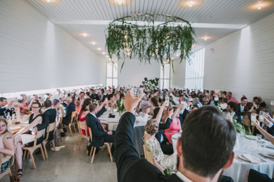 "One of my favorite photos of the night is of Matthew's brother, Ben, raising his glass at the end of his speech," says Mandy.