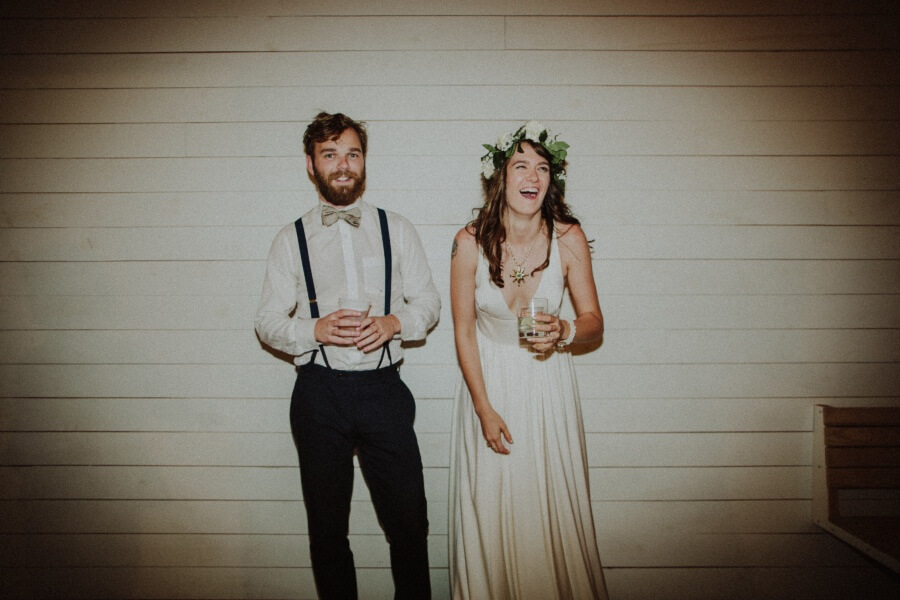 Matthew says something to crack up his beautiful bride.