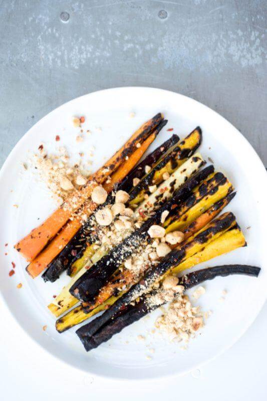 Charred carrots are lightly tossed with honey brown butter and strewn with chopped hazelnuts. Charred carrots are lightly tossed with honey brown butter and strewn with chopped hazelnuts.