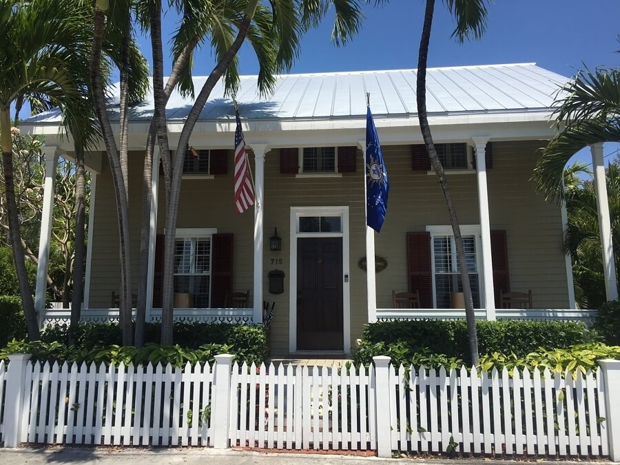Notice how the roof hangs low enough to completely shade the second story windows. That's what makes it an eyebrow house ... like a lush set of brows casting shadows over your eyes. Image: RealtyinKeyWest.com