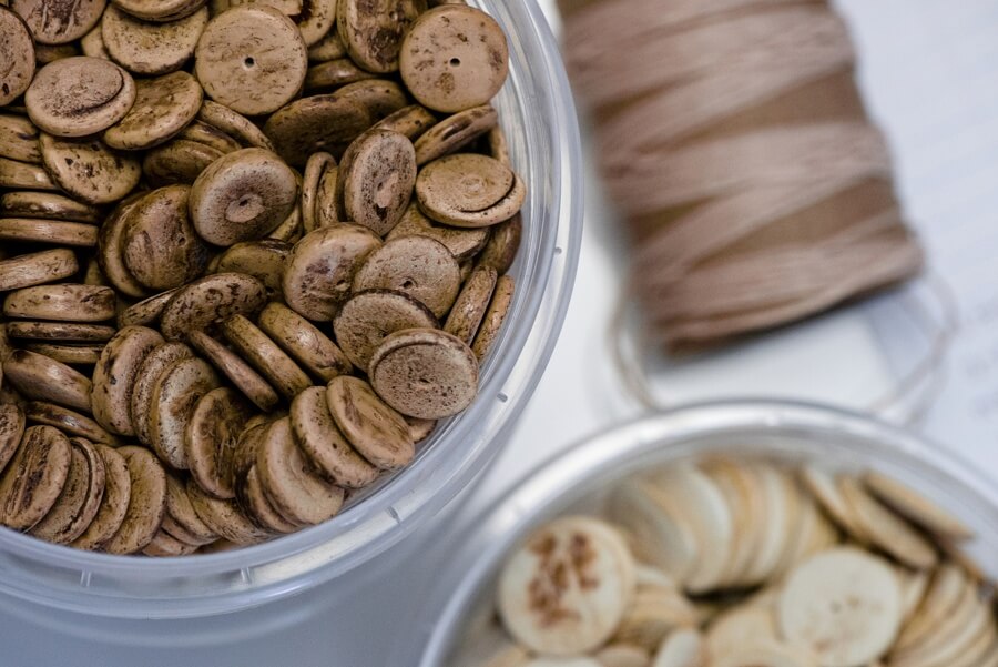 Wooden beads and thread at the Twine & Twig studio 