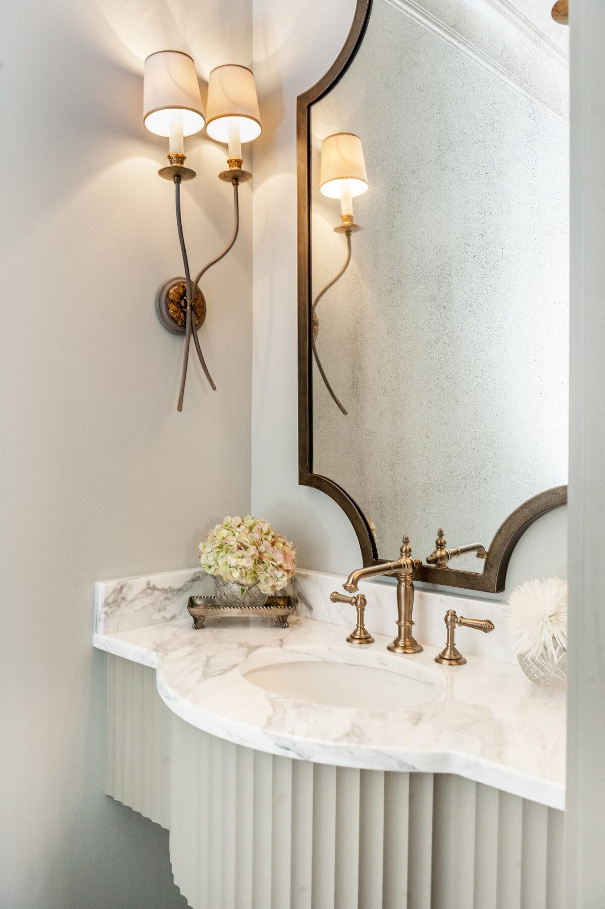 "I love mixing metal finishes," says Joanna. "People are becoming more accepting of everything not being matchy-matchy." Image: T. Scott Carlisle of Christopher Architecture and Interiors