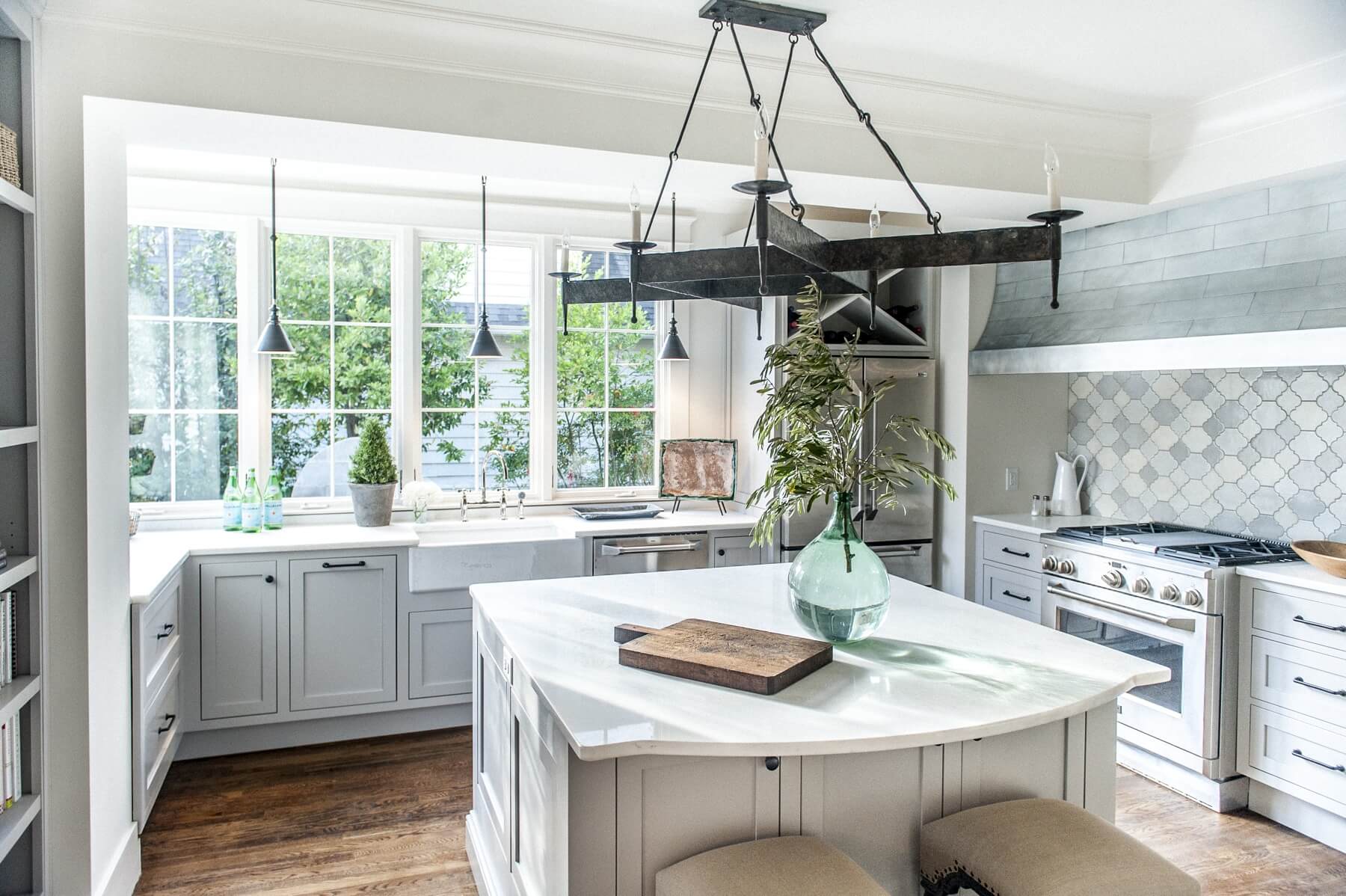 Lighting is one of the driving forces behind Joanna's interiors, and this kitchen is filled with natural light during the day, as well as soft, well-placed lighting for evenings. Image: T. Scott Carlisle of Christopher Architecture and Interiors