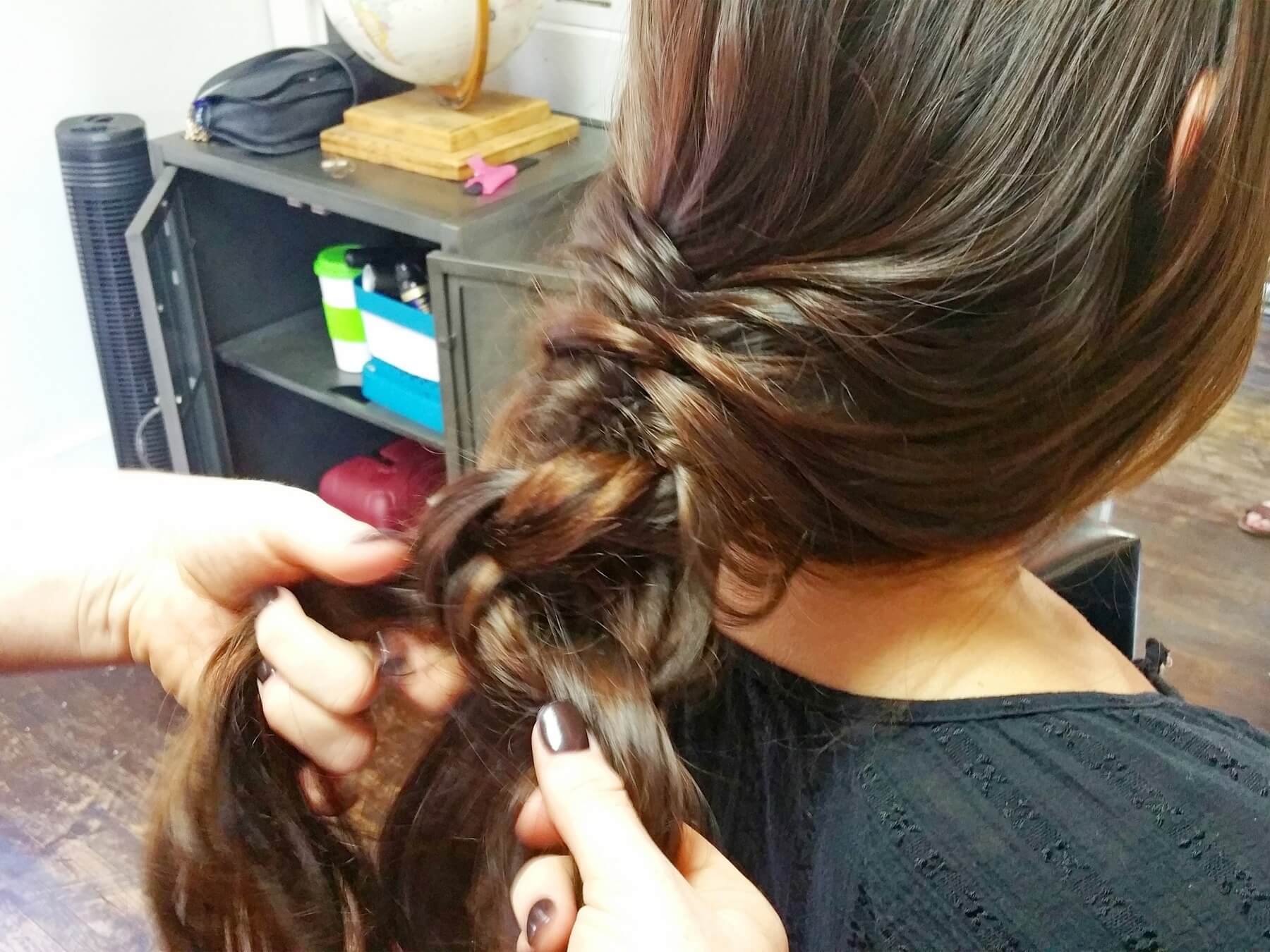 Loosely tie knots through the remainder of the hair. Loosely tie knots through the remainder of the hair.
