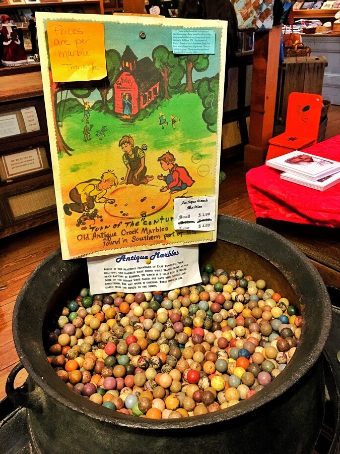 Stop by the commissary to pick up a souvenir — like these antique marbles — from your visit. 