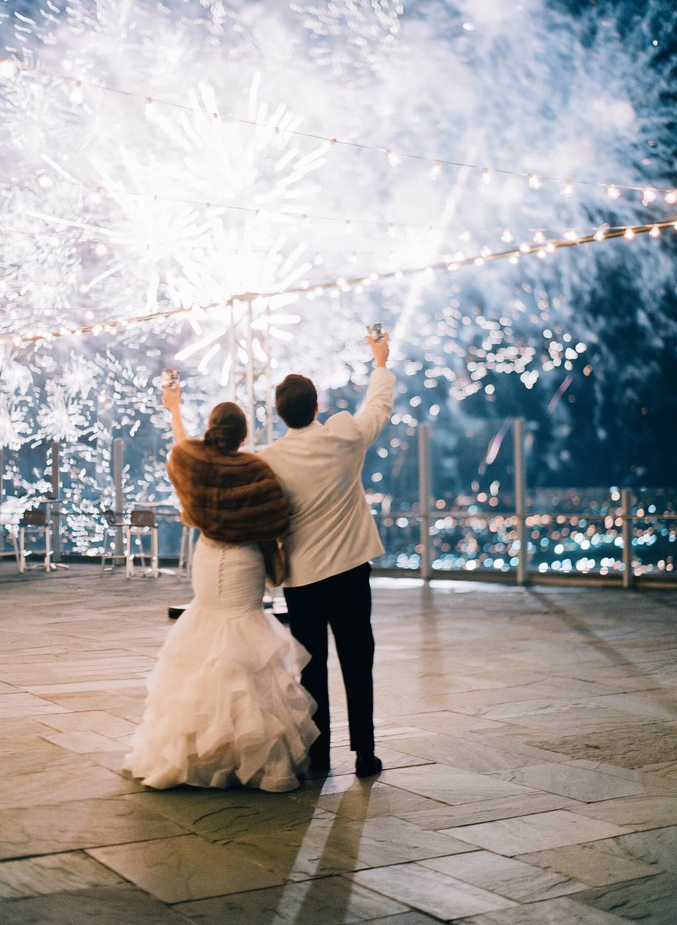 Sparks light up the night sky over Red Mountain as the newlyweds soak in their first evening as Mr. & Mrs. Garber. Sparks light up the night sky over Red Mountain as the newlyweds soak in their first evening as Mr. & Mrs. Garber.