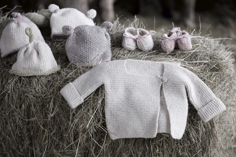 Baby hats, moccasins and the origami sweater | Image: Cade Martin Photography
