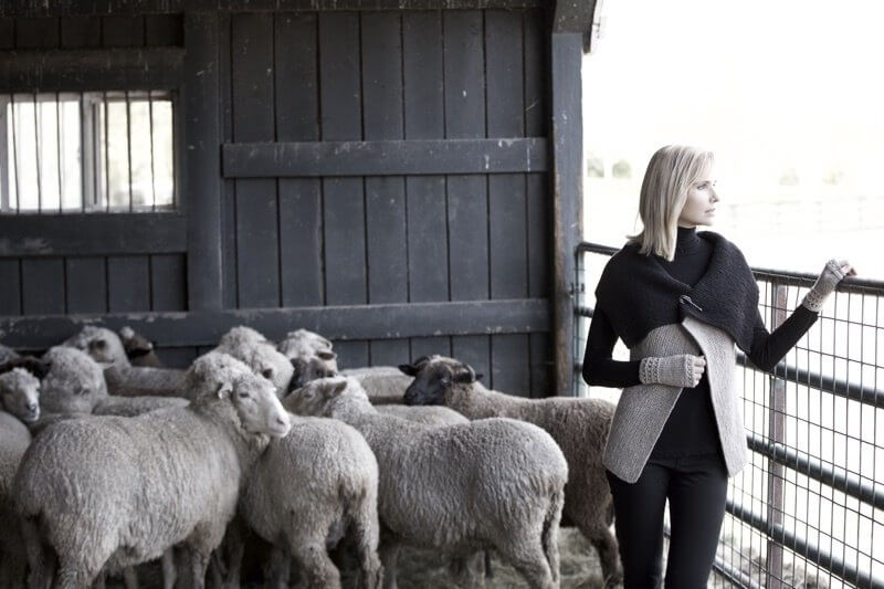 Two-tone sweater with oversized clasp and fingerless mittens | Image: Cade Martin Photography