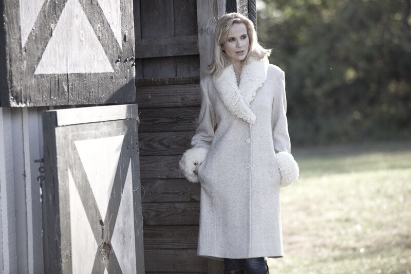 A romantic winter coat of wool with shearling trim | Image Cade Martin Photography