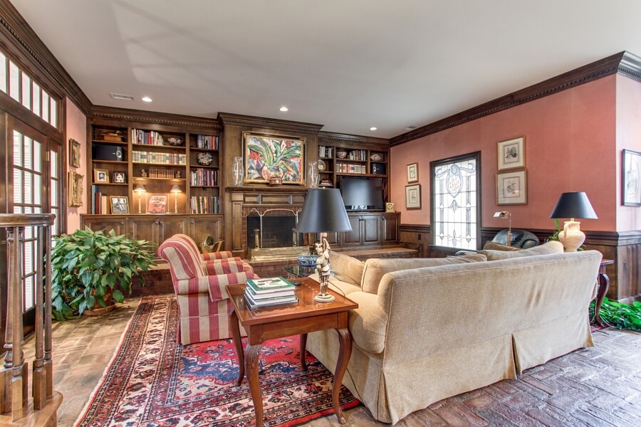 The den, with its warm wood bookshelves, offers a welcoming space to just relax and hang out. The den, with its warm wood bookshelves, offers a welcoming space to just relax and hang out.