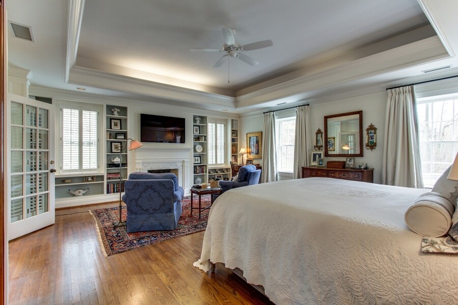 The spacious master bedroom features a fireplace, sitting area, walk-in closets, stunning bathroom and an office. The spacious master bedroom features a fireplace, sitting area, walk-in closets, stunning bathroom and an office.