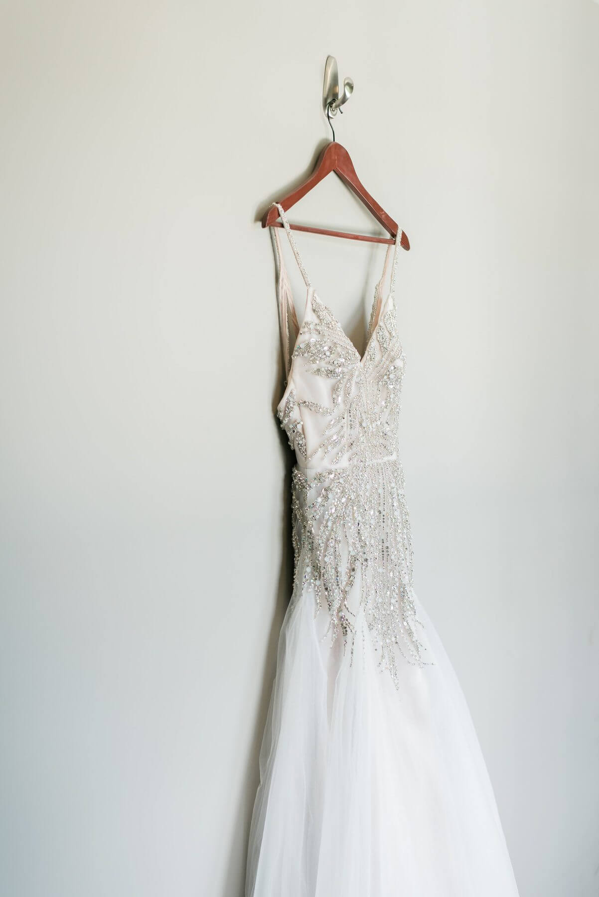 Brittni found her dream wedding dress at Ivory & White in Mountain Brook, where they happened to be hosting a spring 2016 Hayley Paige trunk show. “I tried on her Comet gown. It was the only sample of that dress made at the time and the moment my mom and I saw it on me, it took our breath away,” Brittni says. “My gown made me feel more beautiful and confident than I ever felt before. It was unique, glamorous and classy. Fitted shape, beading, blush underlay — it was the perfect dress.”