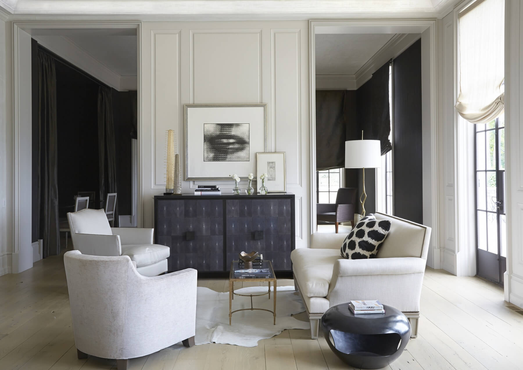 One lovely vignette in the salon features a custom shagreen credenza and a custom upholstered sofa. Image: Jean Allsopp
