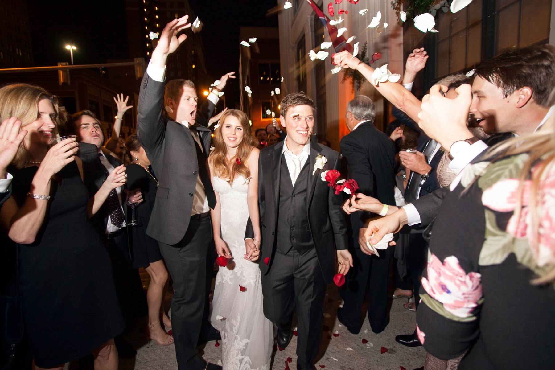 Guests showered the ecstatic couple with flower petals as they departed. Paul and Stephanie honeymooned in Bora Bora. “We had the time of our lives, and I cried when we had to leave!” says Stephanie.