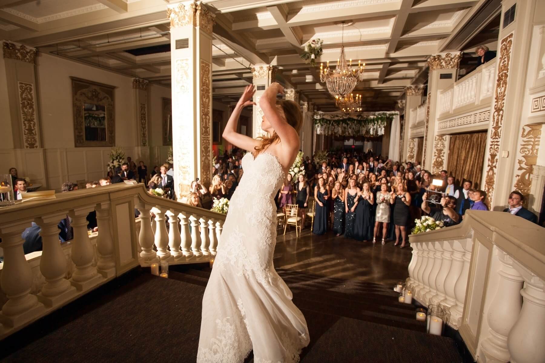 Stephanie tosses the bouquet to the next lucky bride-to-be!