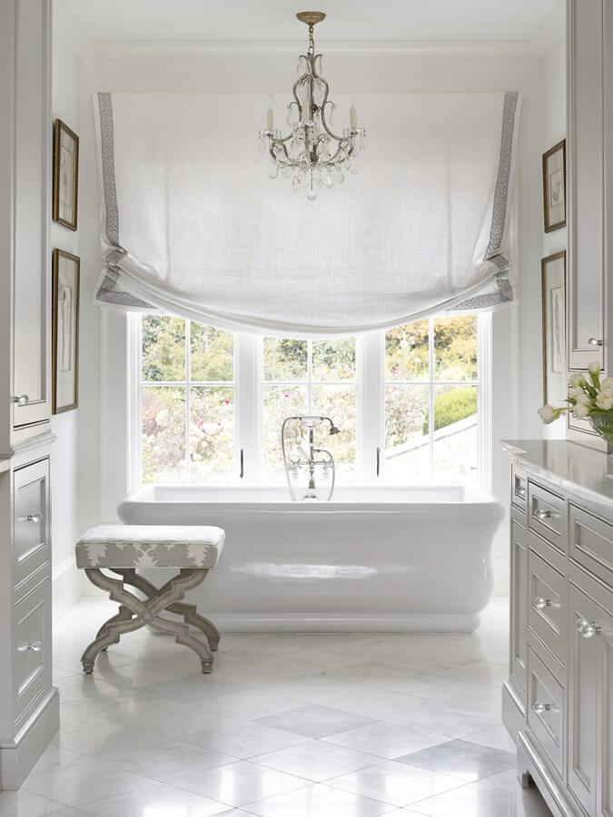 Who wouldn’t want to relax in that beautiful tub in this serene bathroom?