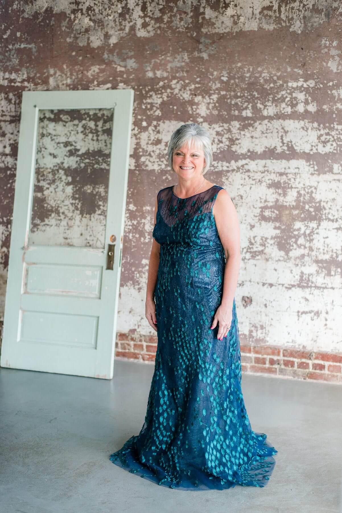 From The Clothes Tree by Deborah: Rene Ruiz turquoise gown with mesh and teal appliqués, $1,525