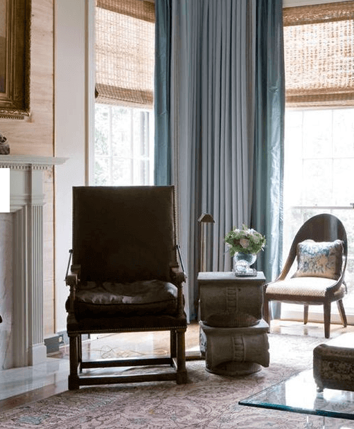 Pair your chairs with side tables to hold books, drinks and flowers. 