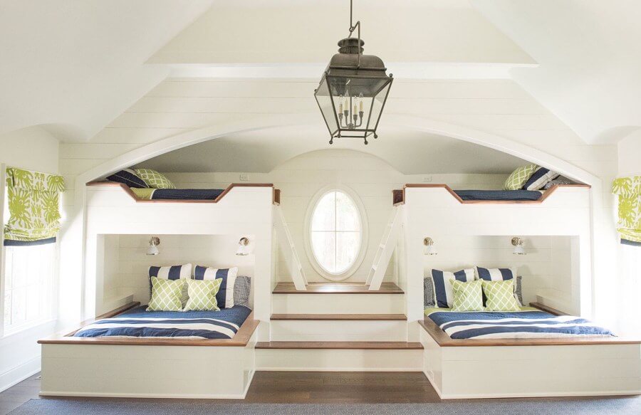 “We really played up the nautical theme in this boys’ bedroom, creating almost a ship-inspired design,” says Bethany. Walls and beams were kept white for a fresh look, with color brought in through the shade made with China Seas fabric, and preppy bedding from Serena and Lily (serenaandlily.com). Lighting is by Circa (circalighting.com) “We really played up the nautical theme in this boys’ bedroom, creating almost a ship-inspired design,” says Bethany. Walls and beams were kept white for a fresh look, with color brought in through the shade made with China Seas fabric, and preppy bedding from Serena and Lily (serenaandlily.com). Lighting is by Circa (circalighting.com)