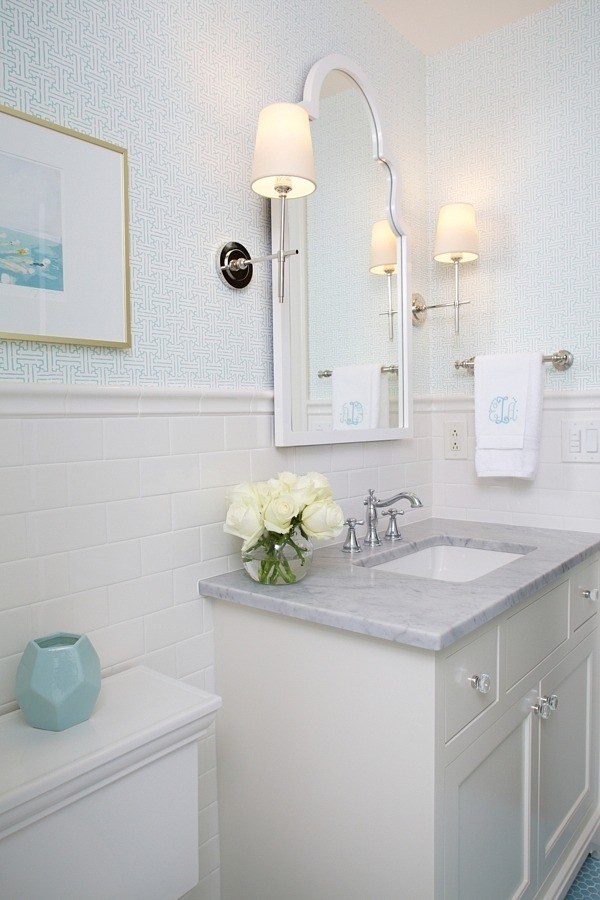 A lucky little girl in Birmingham will enjoy her bathroom with bright blue hexagon tile, a fresh and colorful addition to the otherwise traditional space.
