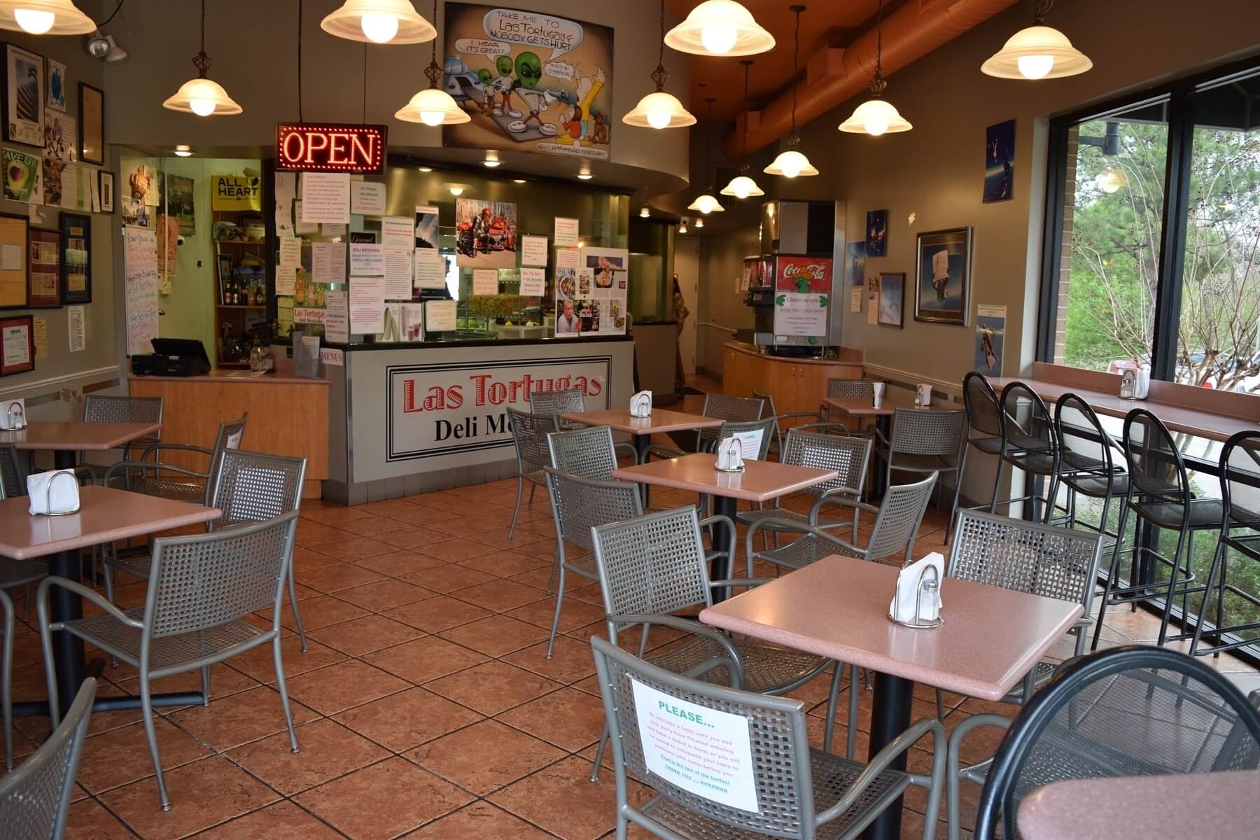 Las Tortugas casual dining room has an open kitchen so you can see your tacos being made fresh to order.