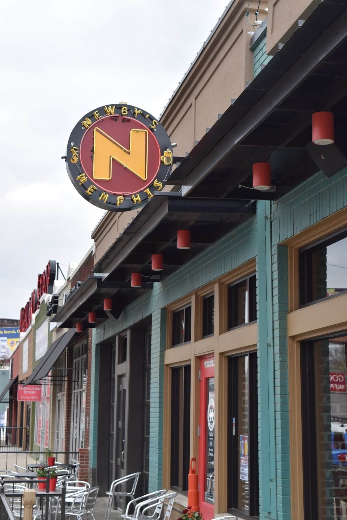 Newby’s iconic logo hangs over the front door. Newby’s iconic logo hangs over the front door.