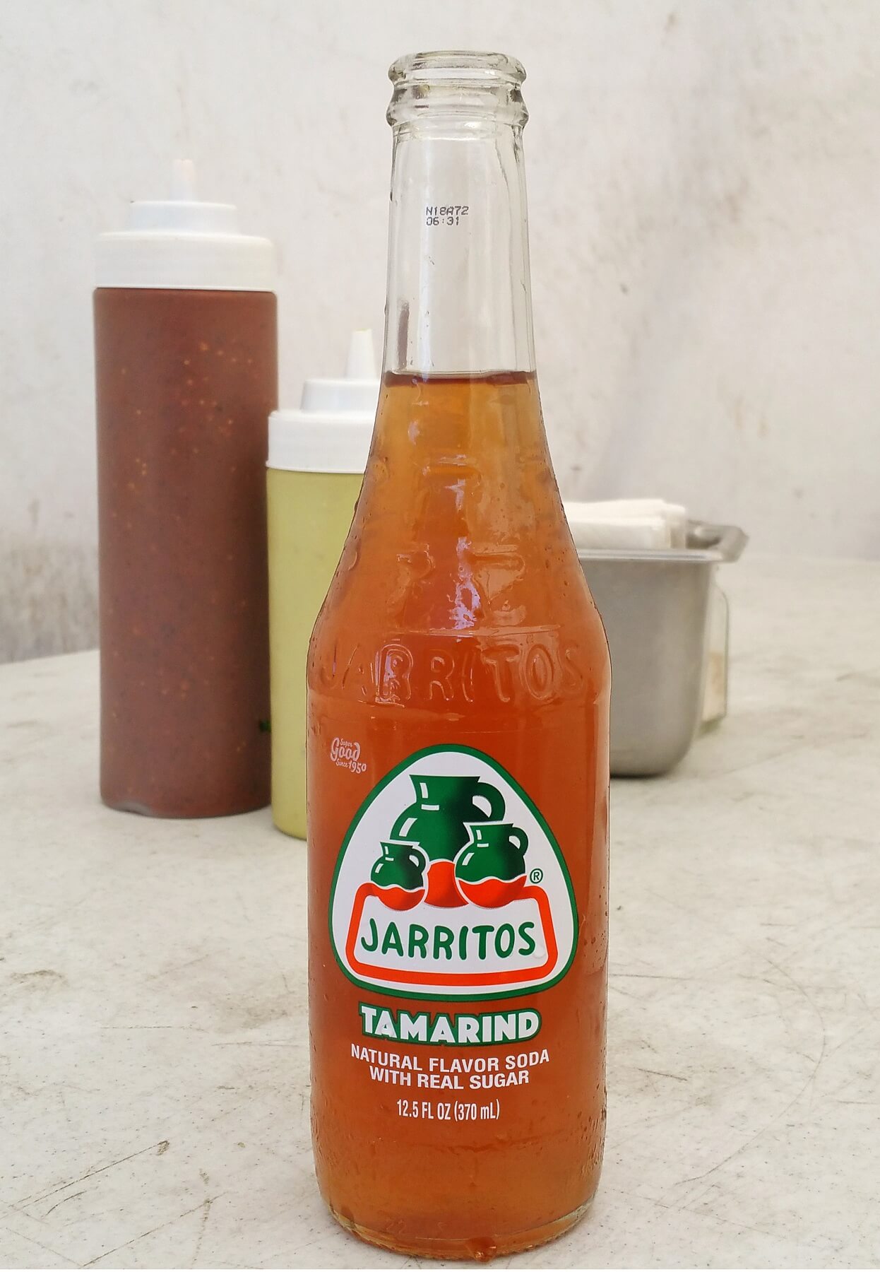 A tamarind-flavored Jarritos all-natural Mexican soda A tamarind-flavored Jarritos all-natural Mexican soda