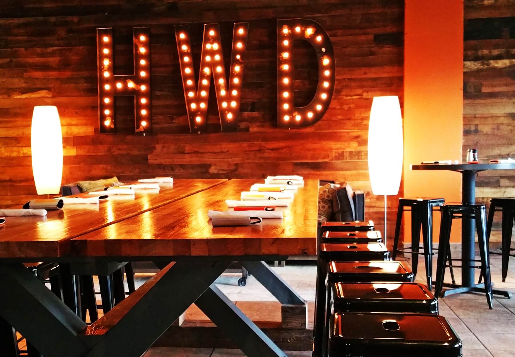 Nods to Homewood are incorporated throughout the decor, and very much so in this "HWD" marquee in the "Social Room," a room that is part lounge, part dining space and can be partitioned off for private parties. Nods to Homewood are incorporated throughout the decor, and very much so in this "HWD" marquee in the "Social Room," a room that is part lounge, part dining space and can be partitioned off for private parties.