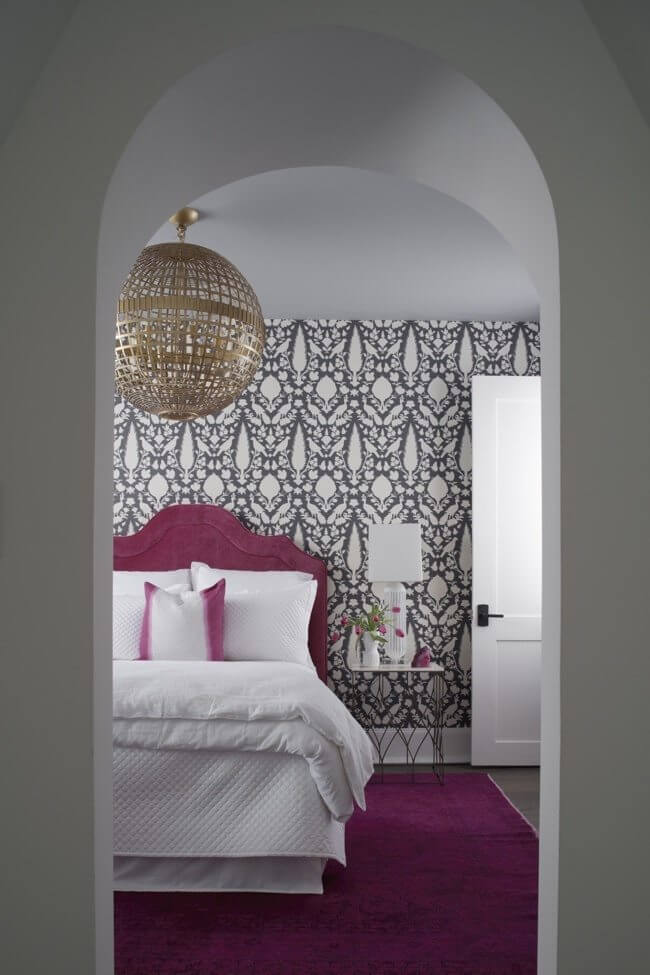 The teenagers' room features a stunning gilded orb ceiling light and pops of pink! The teenagers' room features a stunning gilded orb ceiling light and pops of pink!