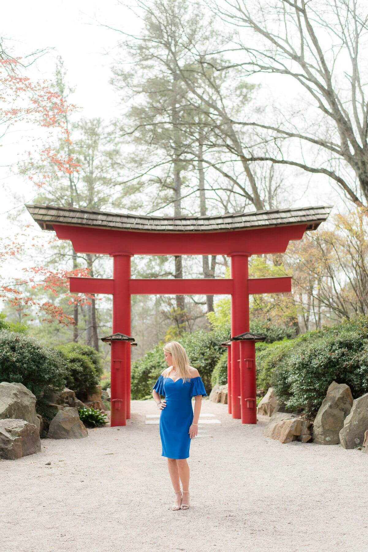 From Monkees of Mountain Brook: Off-the-shoulder blue dress, $385; Schutz nude heels, $170.