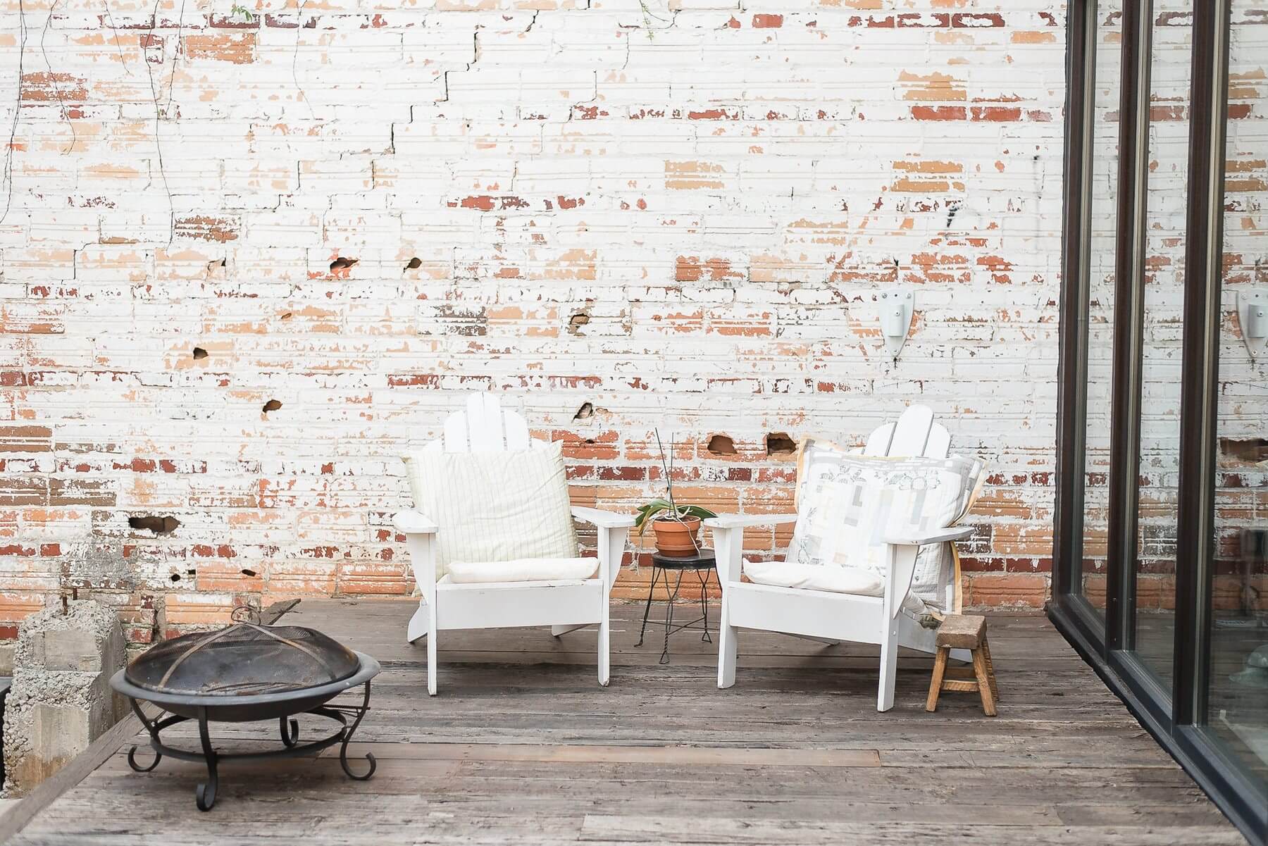 Patio chairs for soaking in the sun and fresh air stand ready for Cheryl and her frequent guests. Patio chairs for soaking in the sun and fresh air stand ready for Cheryl and her frequent guests.