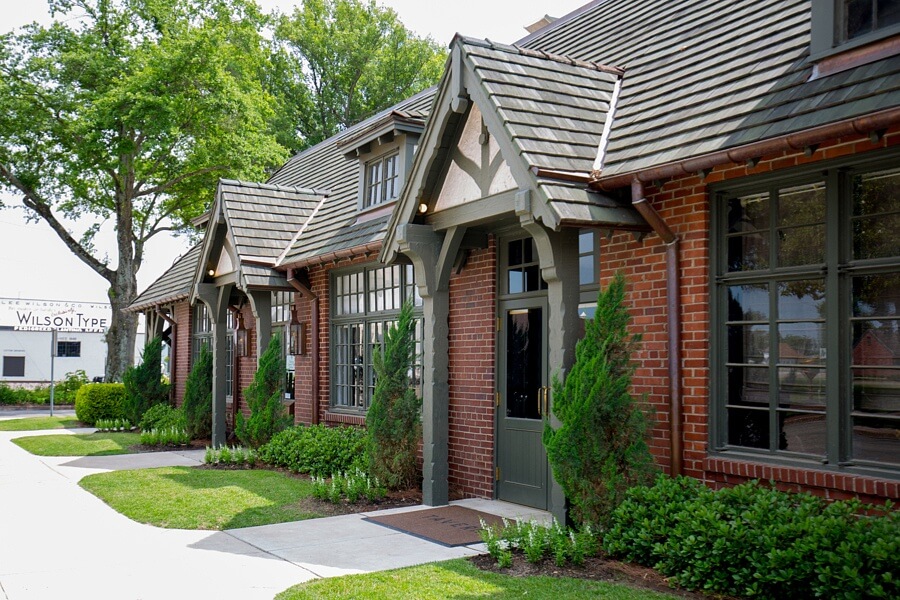 Today, the buildings on Wilsons town square maintains the Tudor architecture design that was so beloved by Lee Wilson. 
