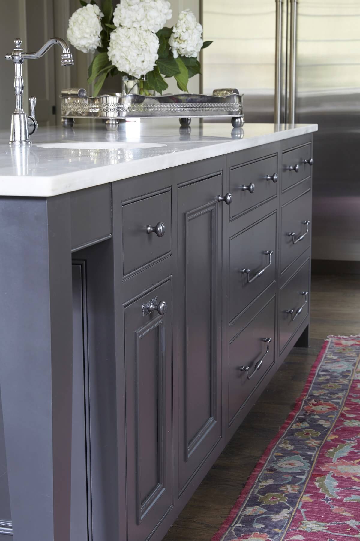 Custom cabinetry and expertly chosen hardware take this island to the next level.