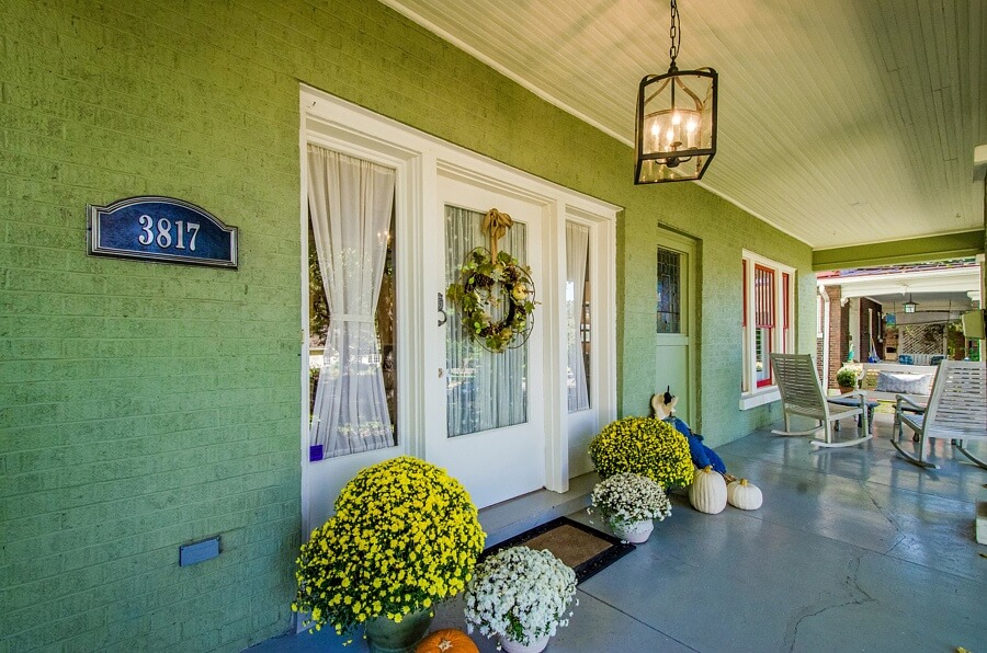 Enjoy a glass of iced tea with a friend, or curl up with a good book ... the options for enjoying this front porch are endless!